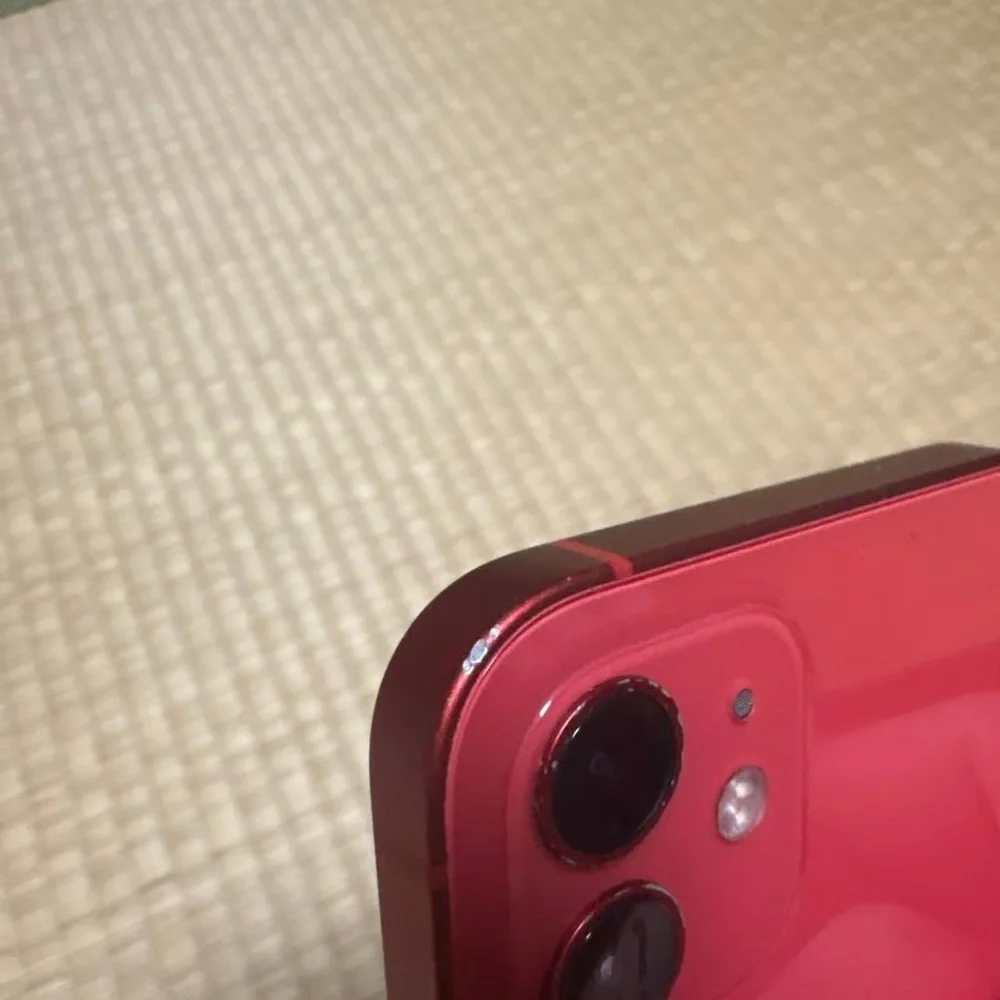 Apple Smartphone in Red with Blue Display